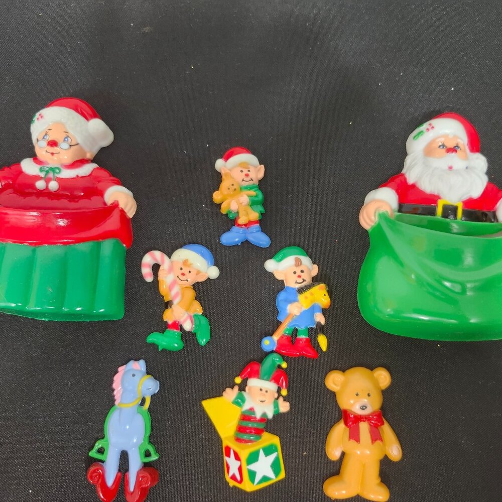 Vintage 1970s JSNY Santa & Mrs. Claus with Toys Plastic Fridge Magnet Set